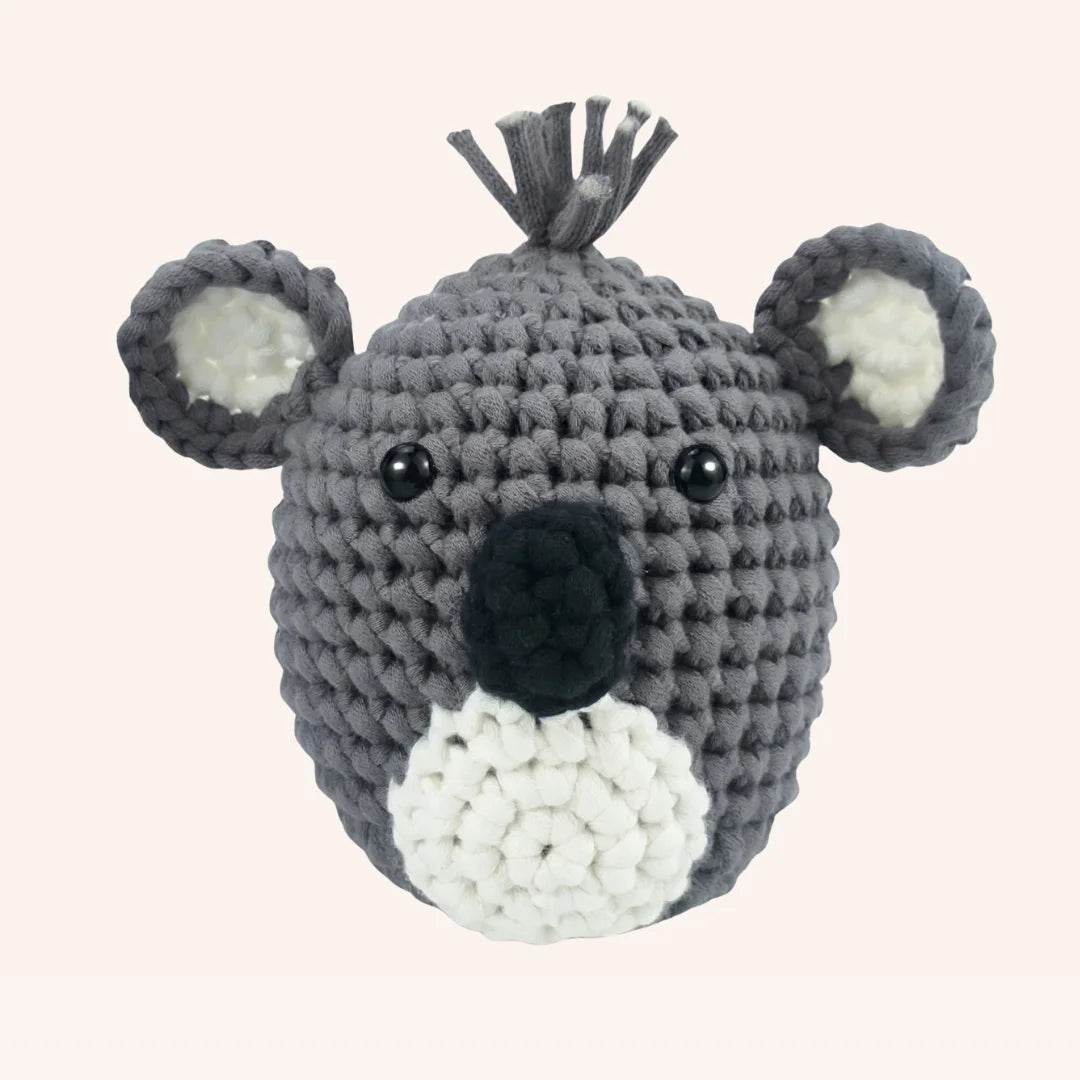 The Outback Cuddle mini crochet koala amigurumi kit with gray yarn, white details, and black safety eyes
