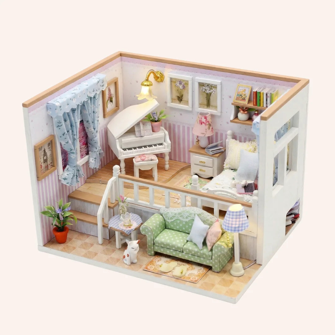 The Piano Parlour DIY miniature dollhouse kit with white piano, green sofa, loft bedroom and cozy living room