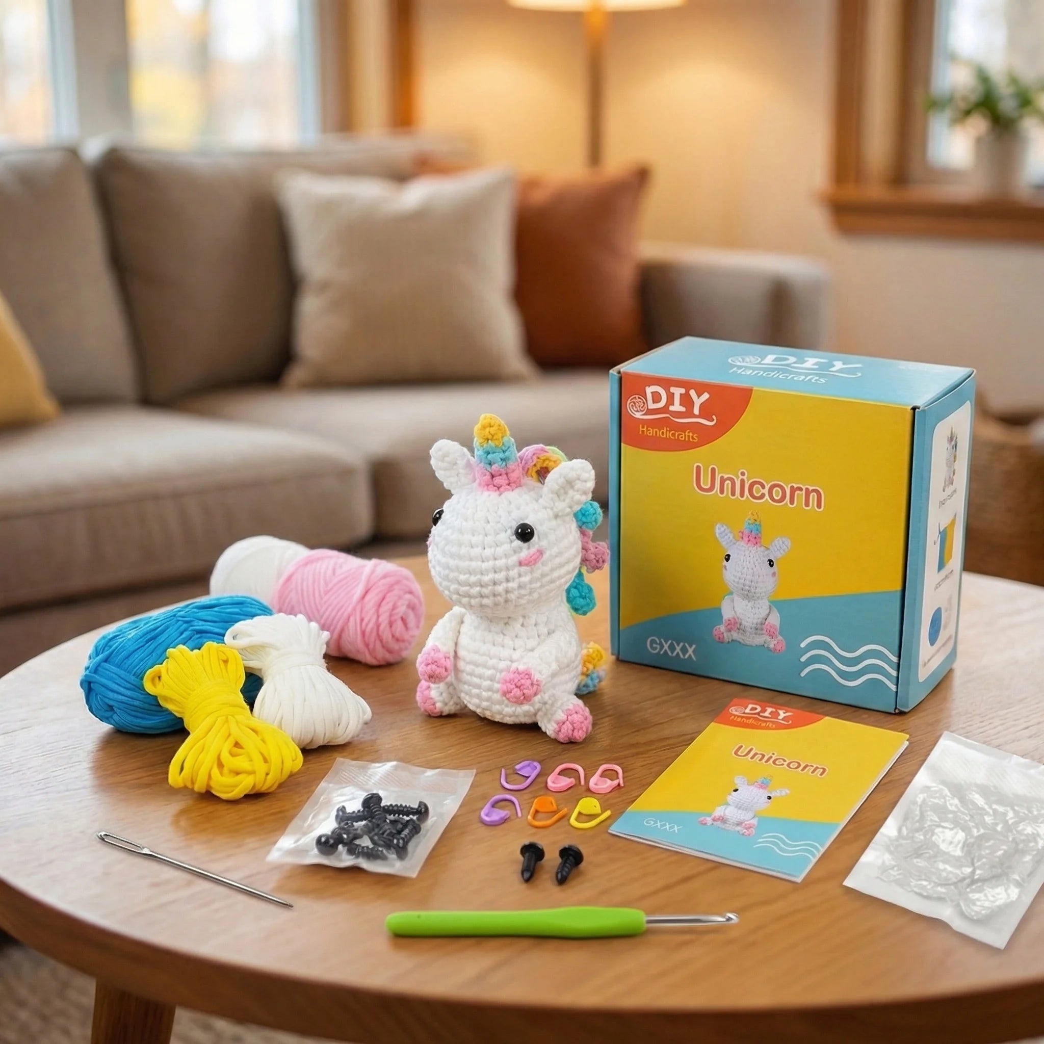 The Rainbow Dreamer DIY crochet kit contents including unicorn amigurumi, yarn, hooks, instructions and accessories