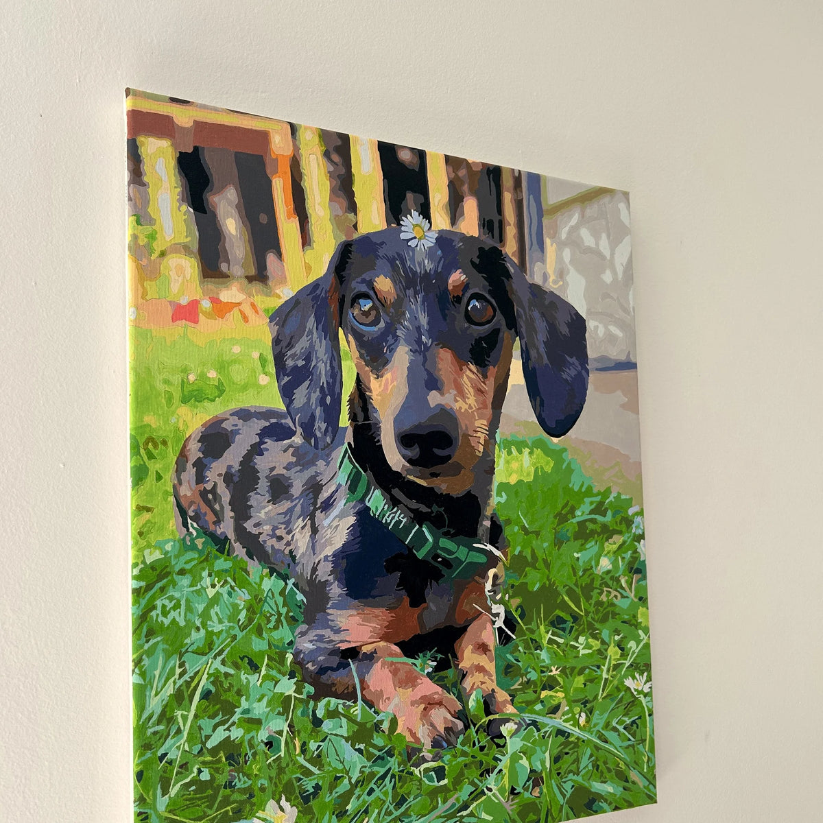 Finished custom pet painting hanging on the wall