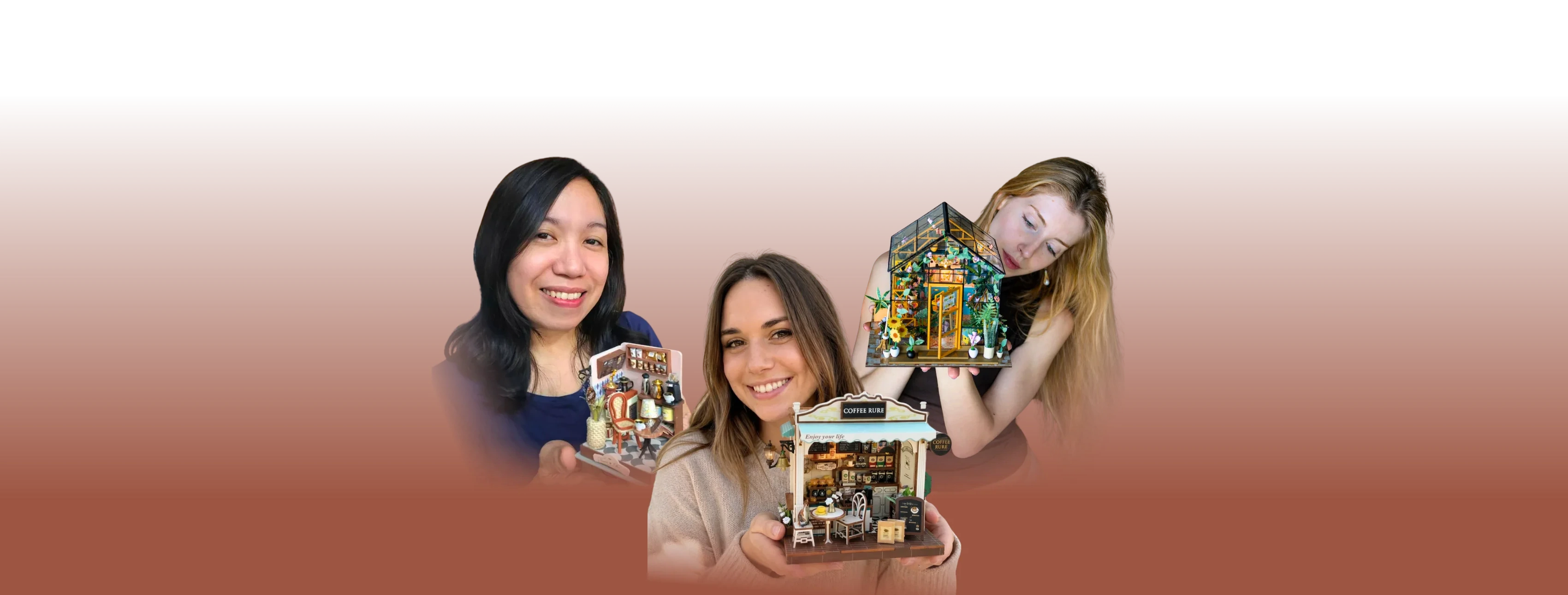 TinyCraft customers holding their finished miniature kits