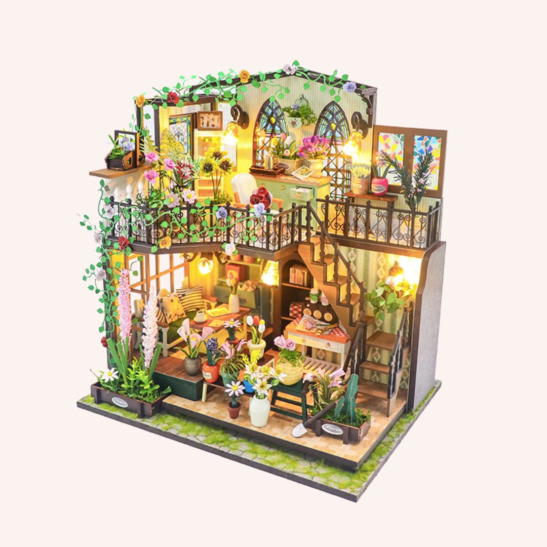 The Flower Loft DIY miniature dollhouse kit with two-story garden balcony, colorful flowers, and LED lights