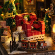 Reading corner detail: tartan armchair, toy train and side table