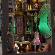 Macro detail of the fortune teller's parlor with reading table and tiny figure inside the nook