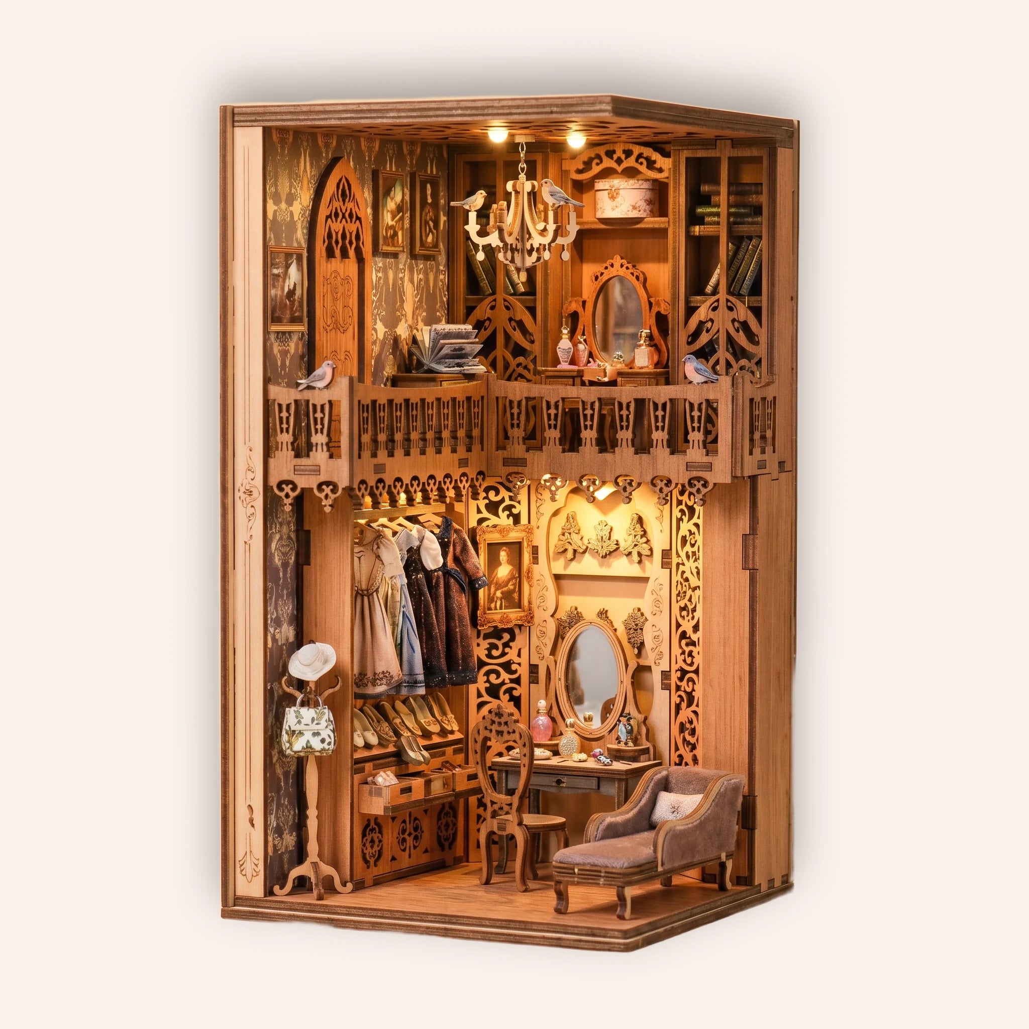 The Dressing Room DIY book nook miniature kit on a cream background, lit warm