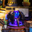 Reactor detail: blue plasma orb on its armored pedestal with violet ring