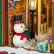 The Festive Alley book nook kit contents – wood pieces, LED lights and materials