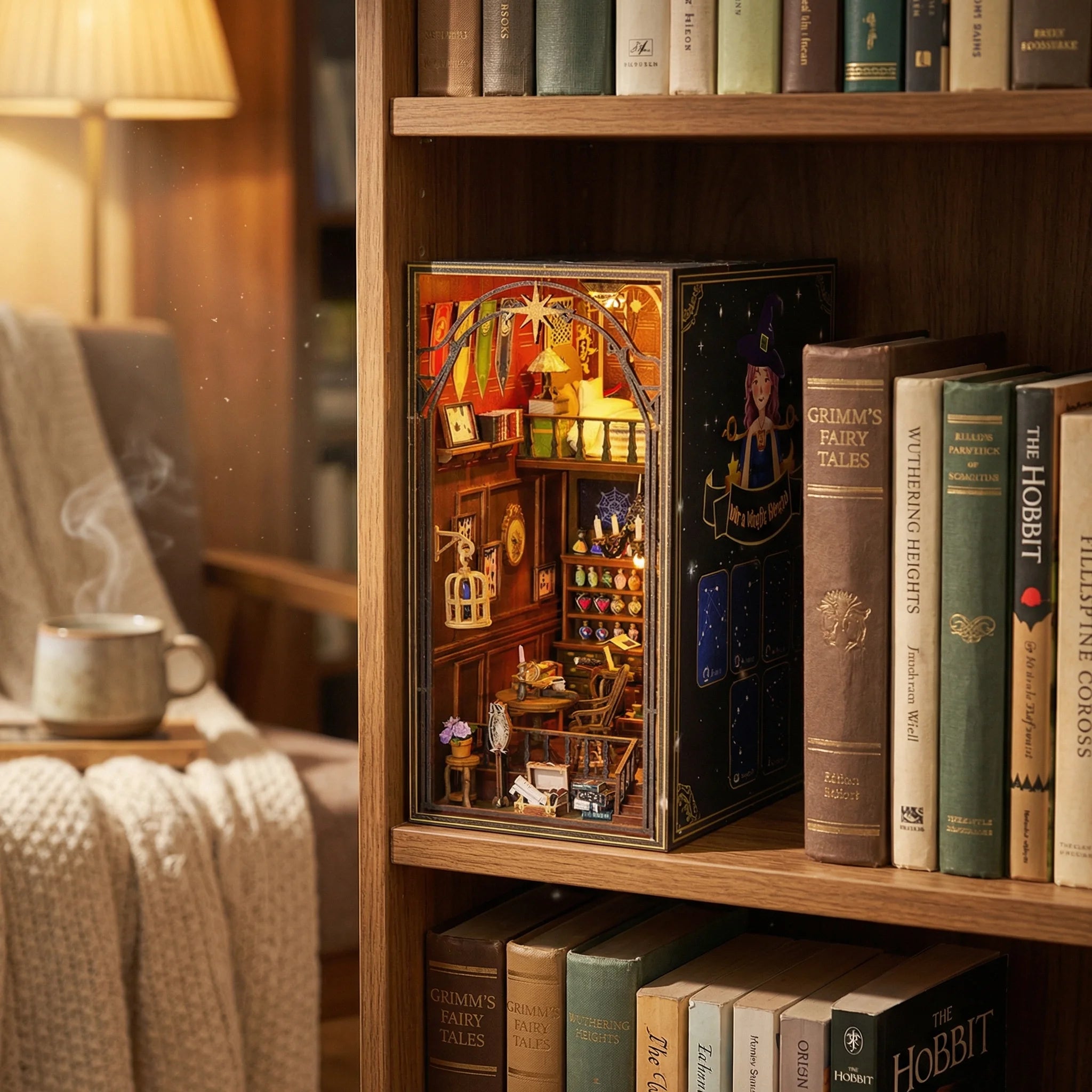 The Wizard's Study miniature book nook diorama displayed on bookshelf with fairy tale books and cozy lamp