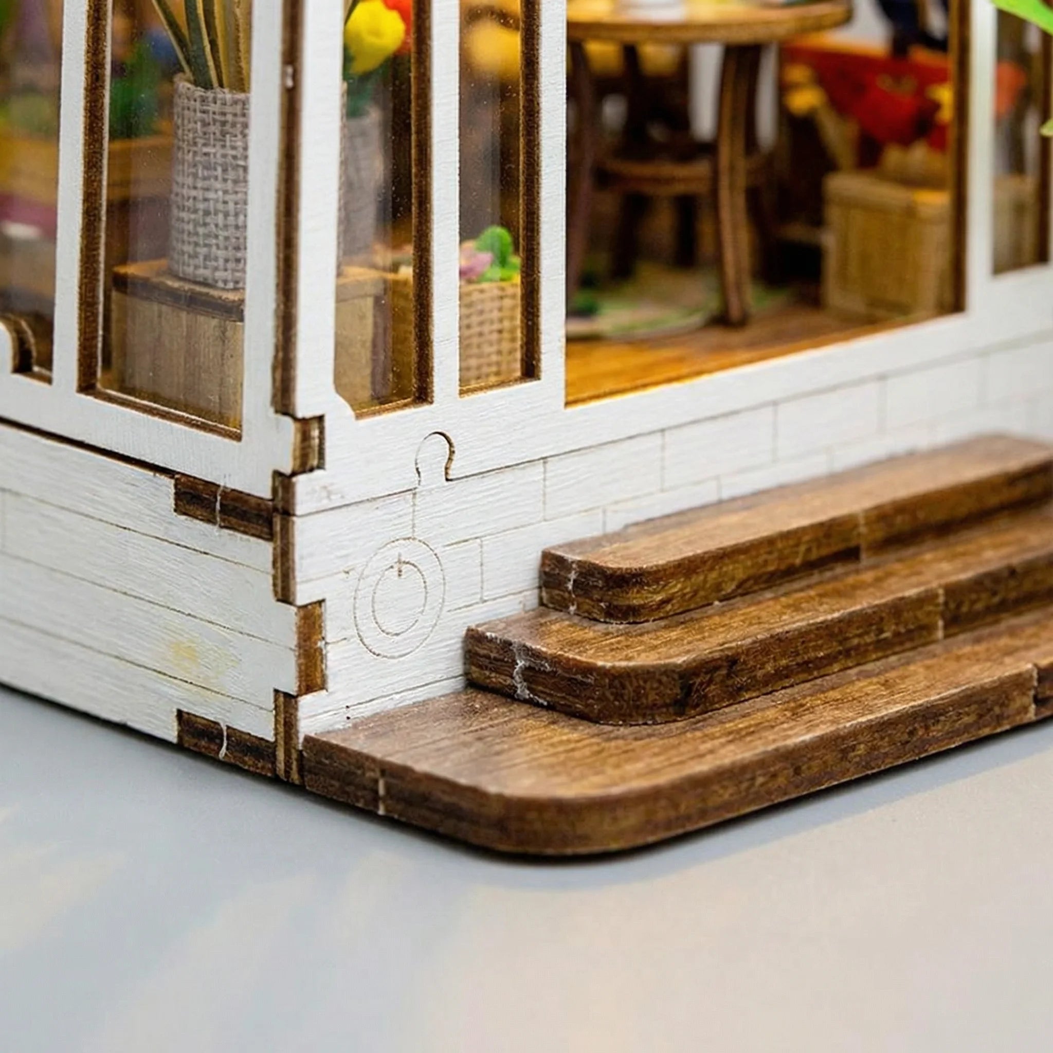 The Garden House miniature kit wooden steps and white brick wall detail with laser-cut construction