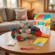 The Blooming Pair crochet kit contents – yarn, hook, safety eyes and guide