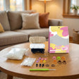 Hamish the Highland Cow crochet kit contents – yarn, hook, safety eyes and guide