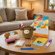 Rosie the Highland Cow crochet kit contents – yarn, hook, safety eyes and guide