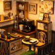 Close-up of the dining corner with a round table, tiny latte and chair inside The 1987 Cafe