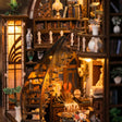 Close-up of the sweeping spiral staircase and carved banister inside The Bacchus Bookstore