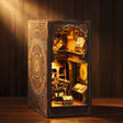 The Stargazer DIY book nook kit, a Victorian astronomer's observatory glowing warm amber on a dark walnut surface