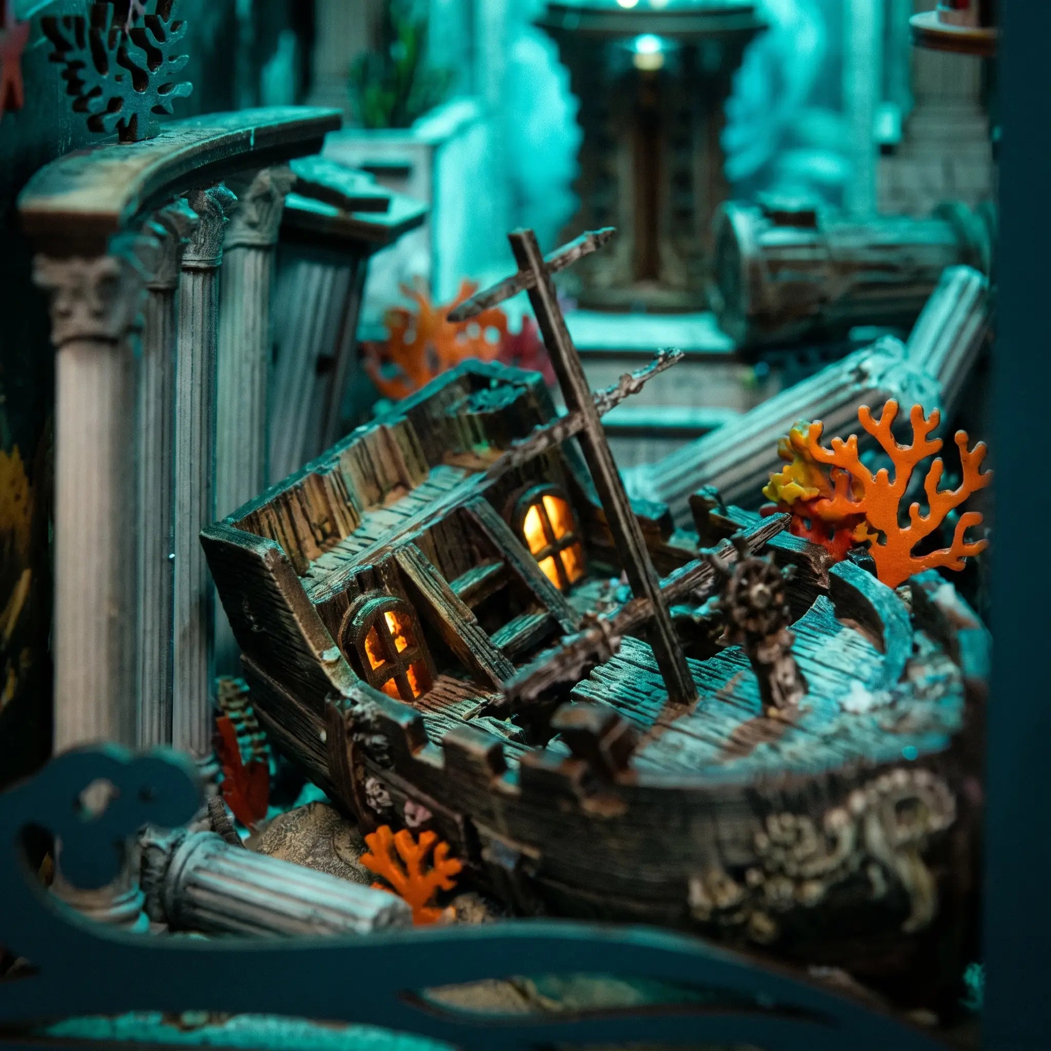 The Sunken World detail, half-buried shipwreck with warm lights among the ruins