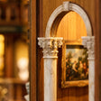 Marble column and arch detail inside The Grand Exhibition book nook