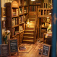 Close-up of the wooden staircase rising to the upper reading level inside The Corner Bookshop