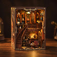 The Cathedral Library gothic magic library book nook, lit interior on a dark walnut surface