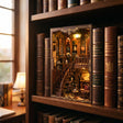 The Cathedral Library book nook slotted on a bookshelf at dusk, glowing warm