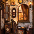Close-up of the grandfather clock and arched window inside The Music Room kit