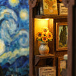 Close-up of sunflowers in a vase inside The Artist's Studio book nook