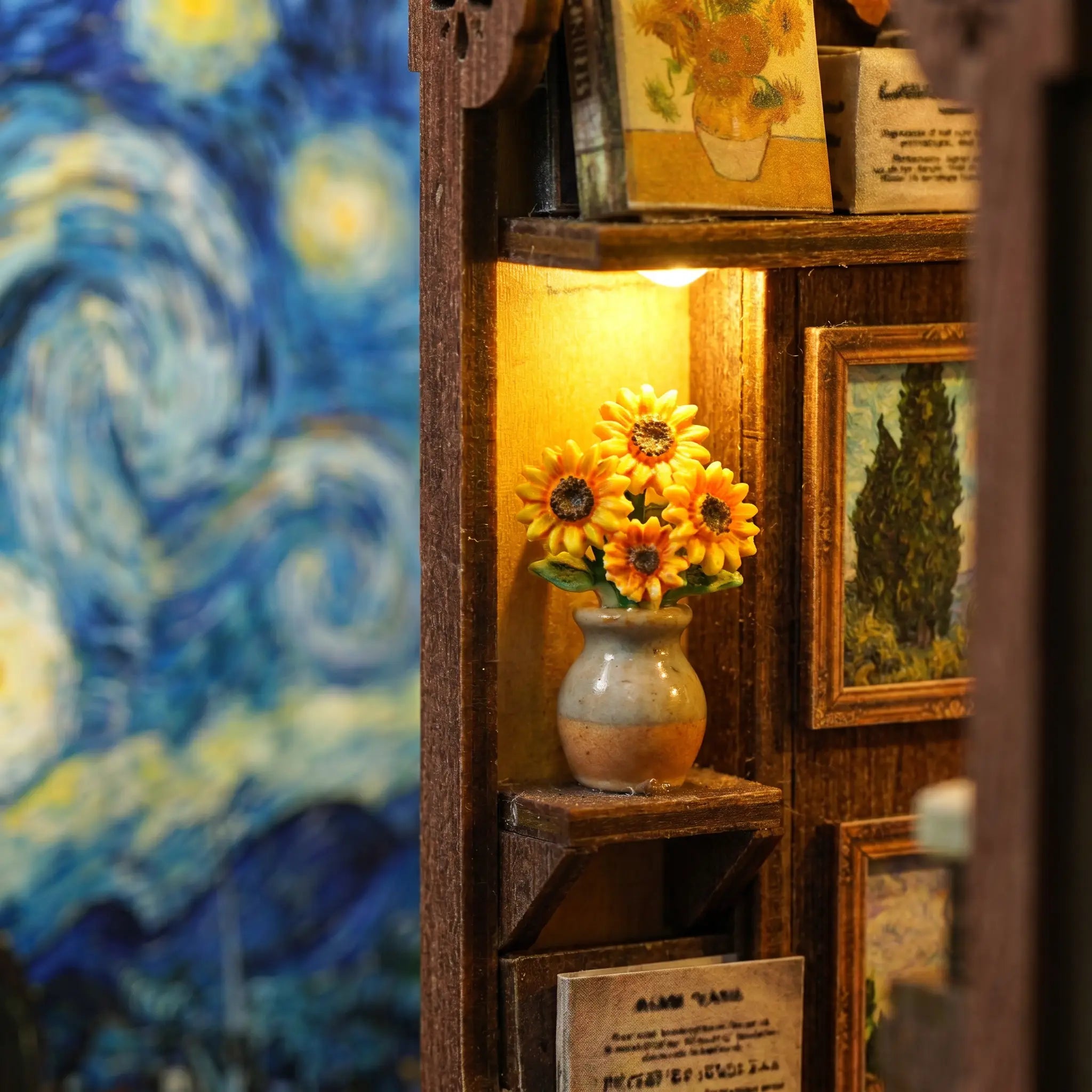 Close-up of sunflowers in a vase inside The Artist's Studio book nook