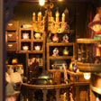 Macro close-up of the lit alchemy academy interior with potion shelves