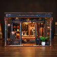 The Tailor's Atelier miniature bespoke menswear boutique, dark backdrop hero
