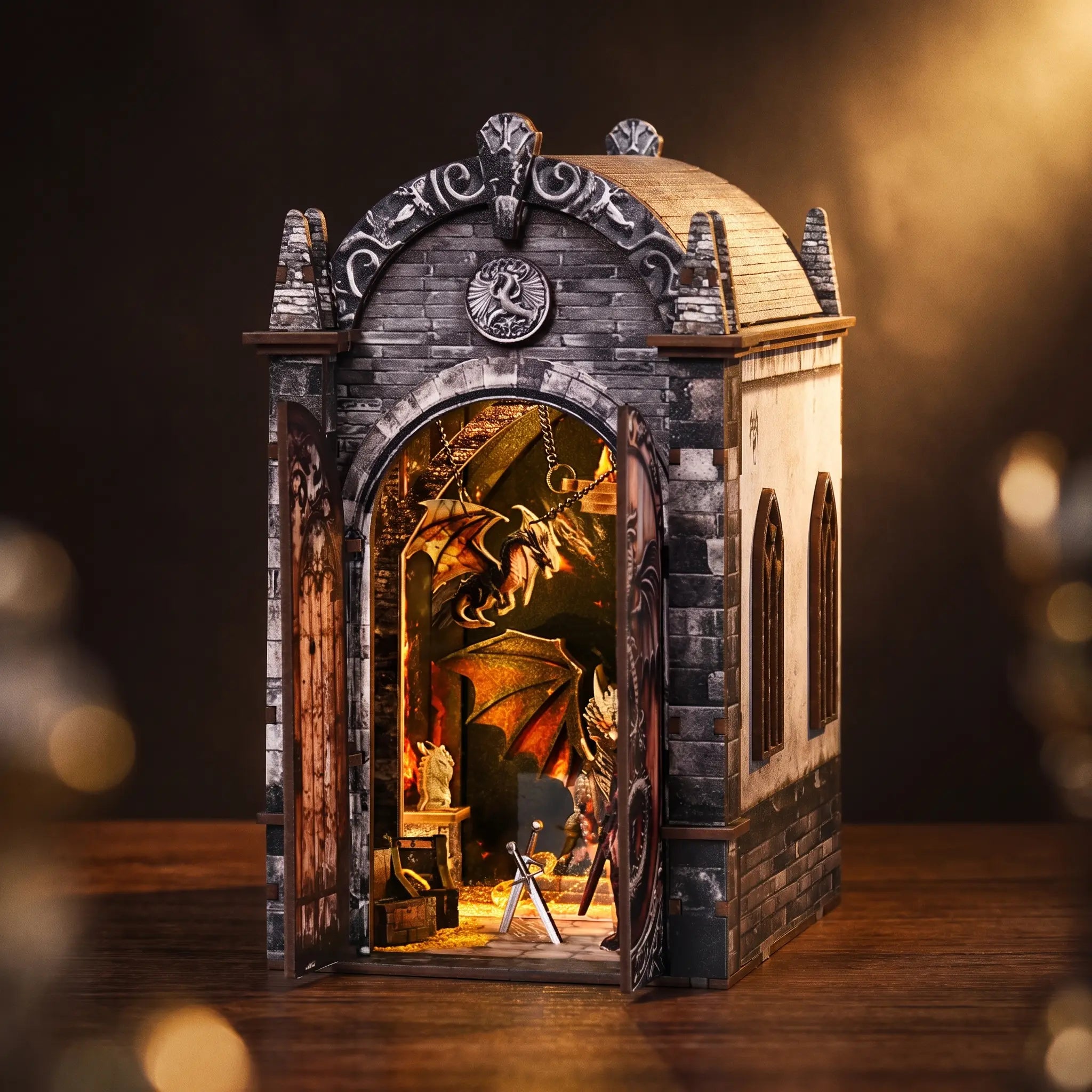 The Dragon's Keep gothic castle book nook on dark walnut with warm amber glow