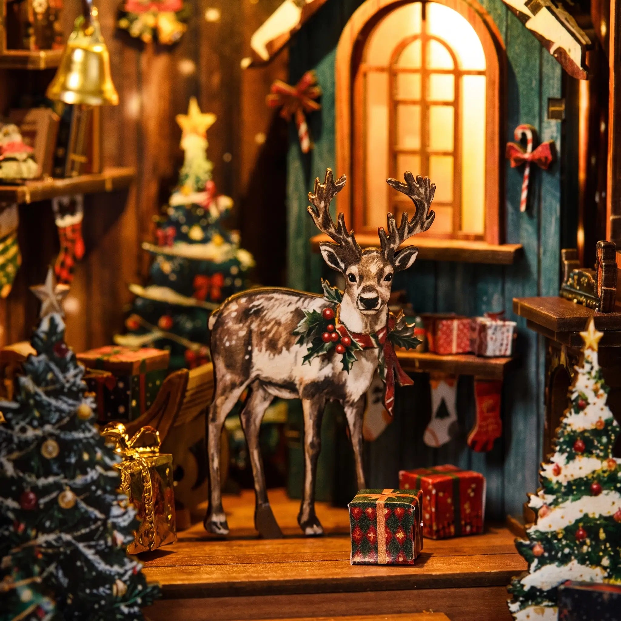 Close-up of the little reindeer among wrapped gifts in The Snow Cabin