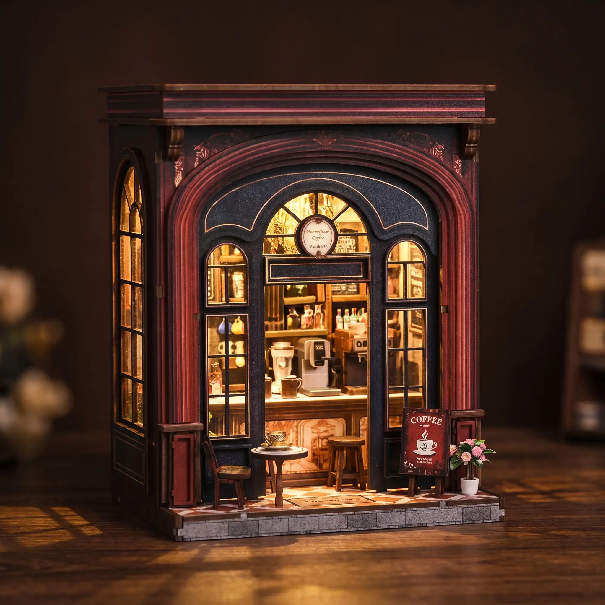 The Coffee Corner DIY miniature Victorian coffee shop, front three-quarter view with warm interior glow