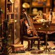 Close-up of the miniature violin inside The Detective's Study