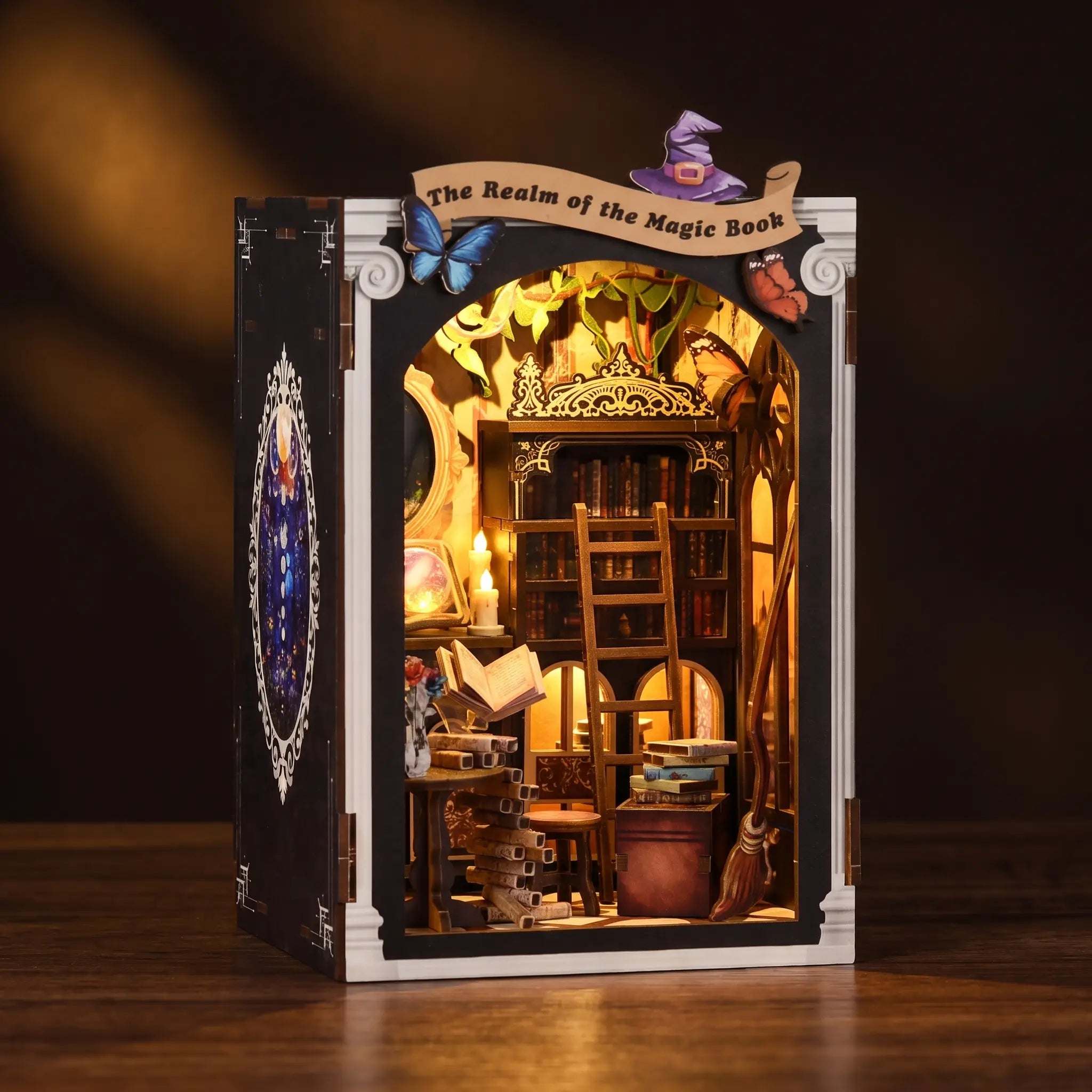 The Spellbound Library on a dark walnut backdrop, warm amber interior glow