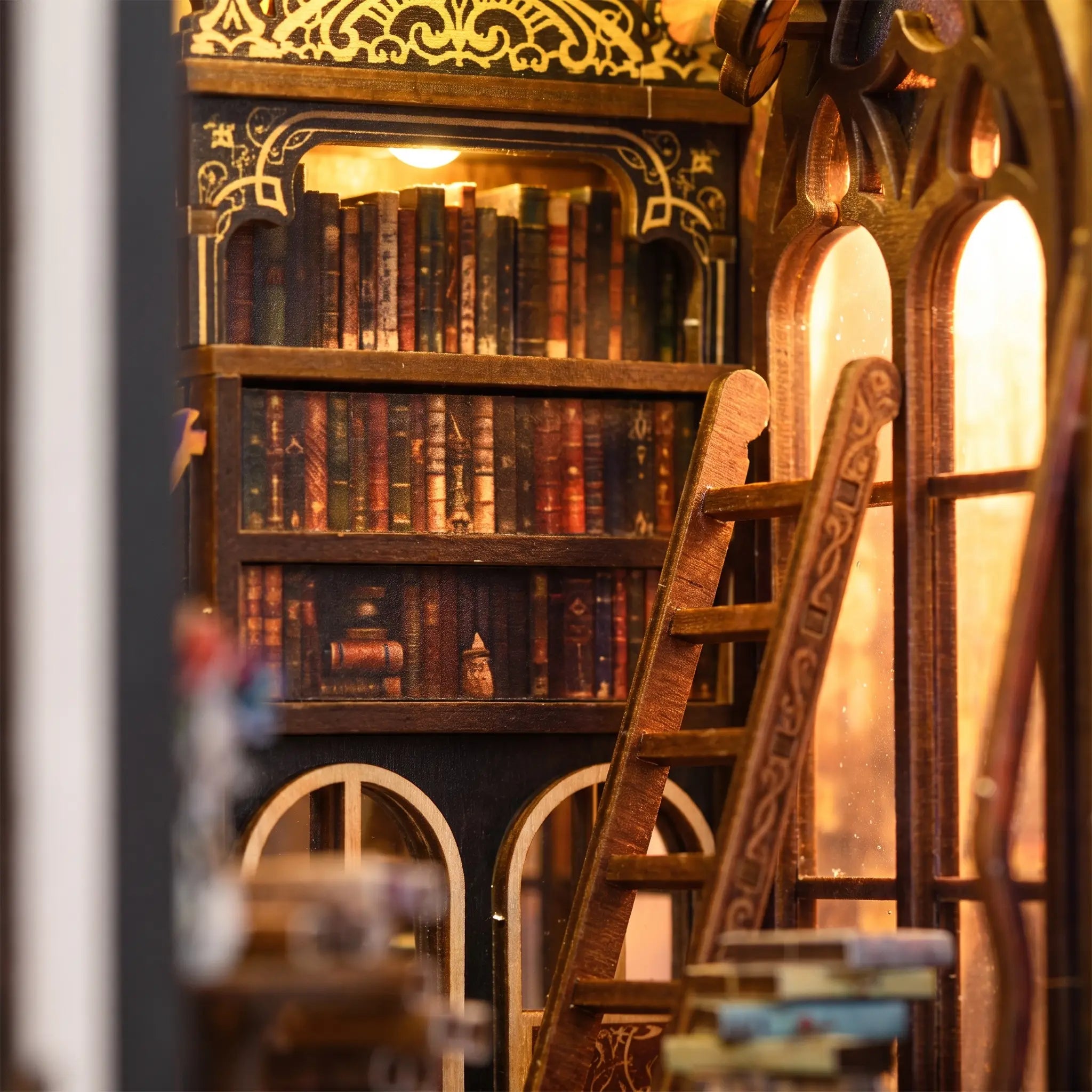Close-up of the tall bookshelves and sliding ladder in The Spellbound Library