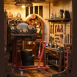 Macro detail of the lit garage interior with the classic car and tools