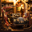 Close-up of the classic vintage car on the engine hoist in The Repair Shop