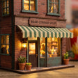 Close-up of the striped awning and brick storefront of The Teddy Bear Shop