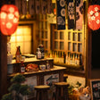 Close-up of the warmly lit interior bar of The Izakaya miniature