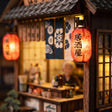 Close-up of the glowing red paper lanterns of The Izakaya