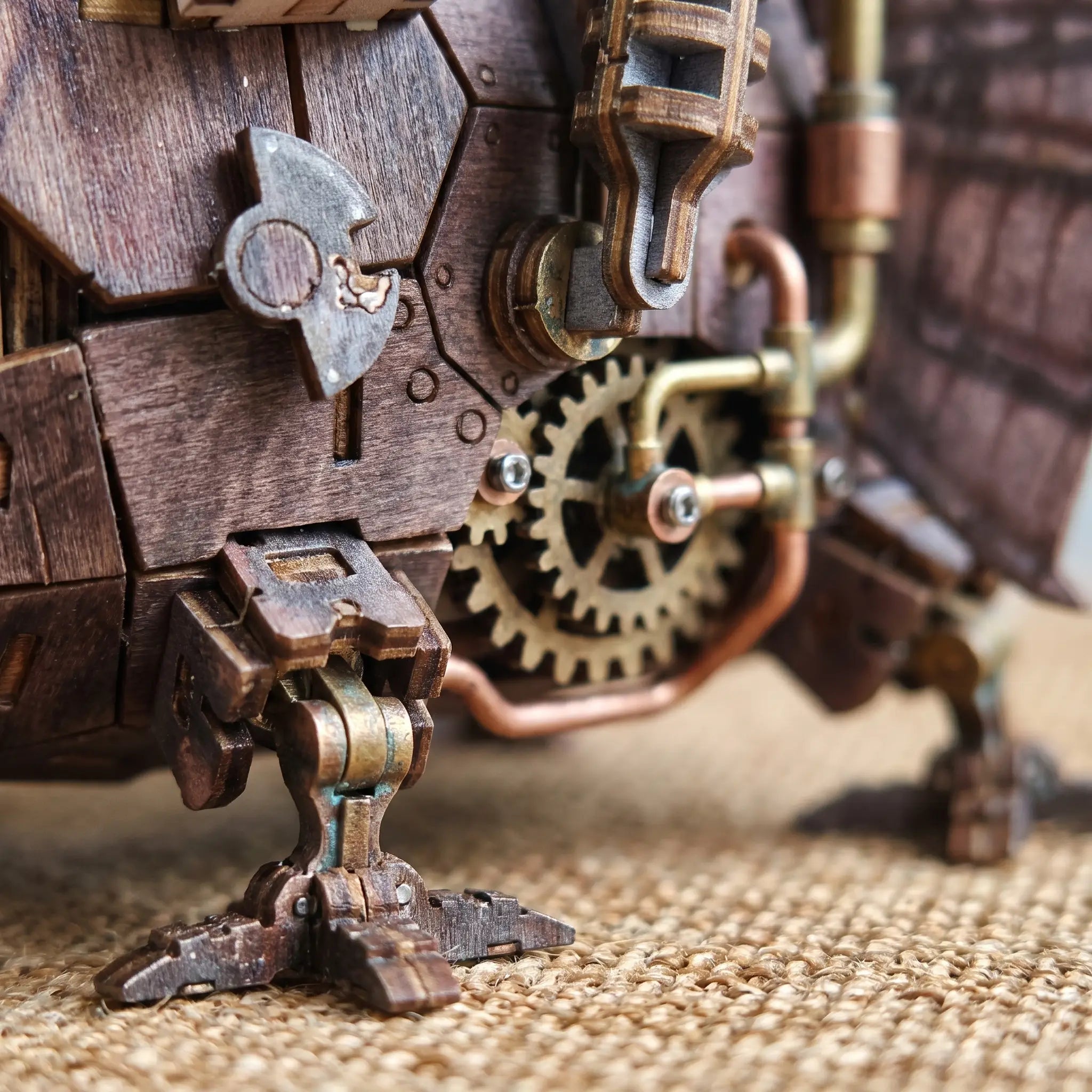 Macro detail of the gears and mechanical legs of The Moving Castle
