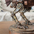 Close-up of the articulated mechanical bird-like legs and feet