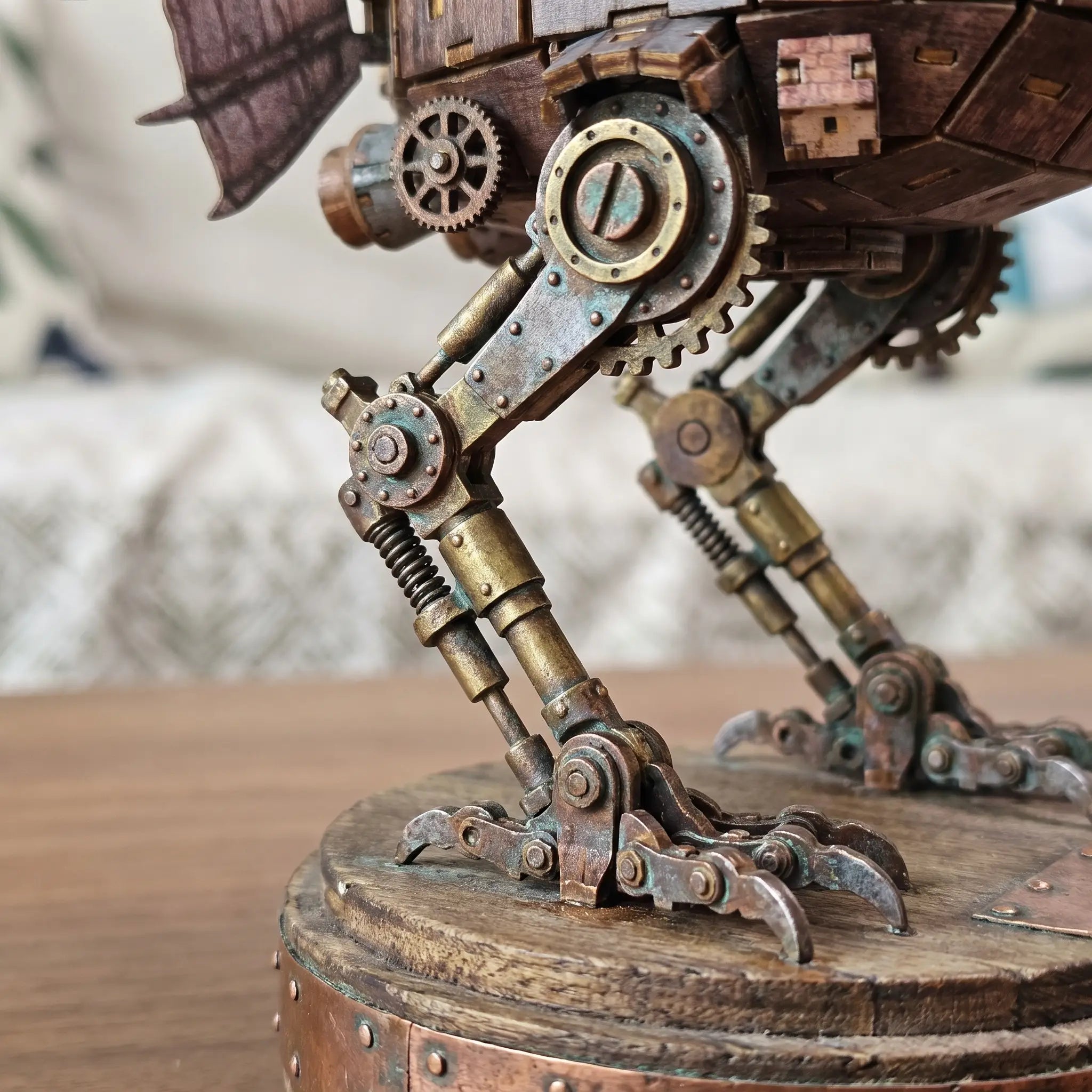 Close-up of the articulated mechanical bird-like legs and feet