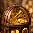 Close-up of the open dome and brass telescope inside The Observatory