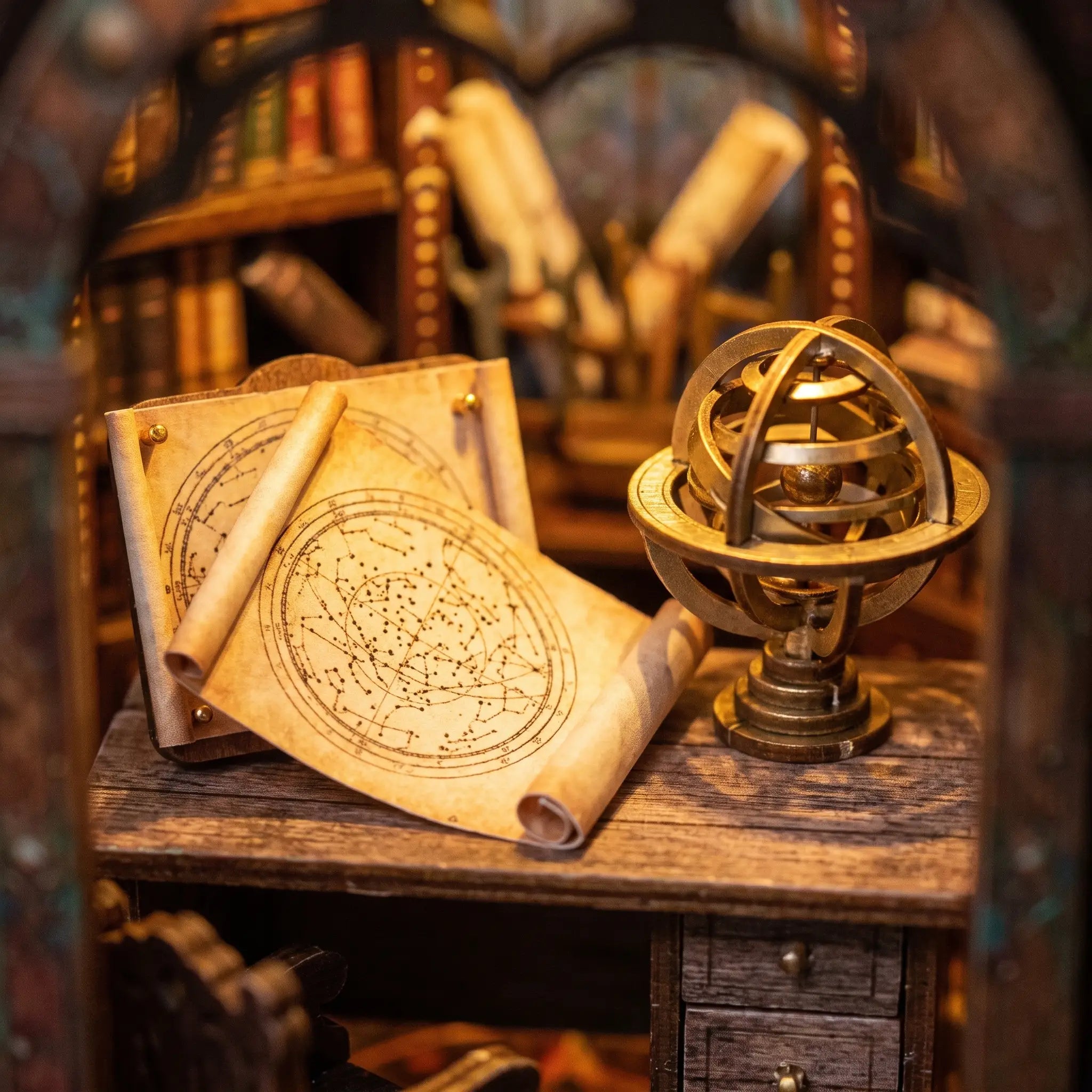 Star charts and a brass armillary sphere inside The Observatory