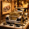 Close-up of a polished antique car inside The Classic Garage showroom
