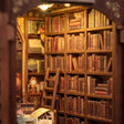 Towering bookshelves packed with tiny books inside The Book Emporium