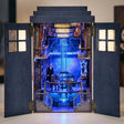 Close-up of the open paned doors of The Time Booth framing the glowing console room