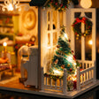 Close-up of the decorated lit Christmas tree inside The Christmas Parlour
