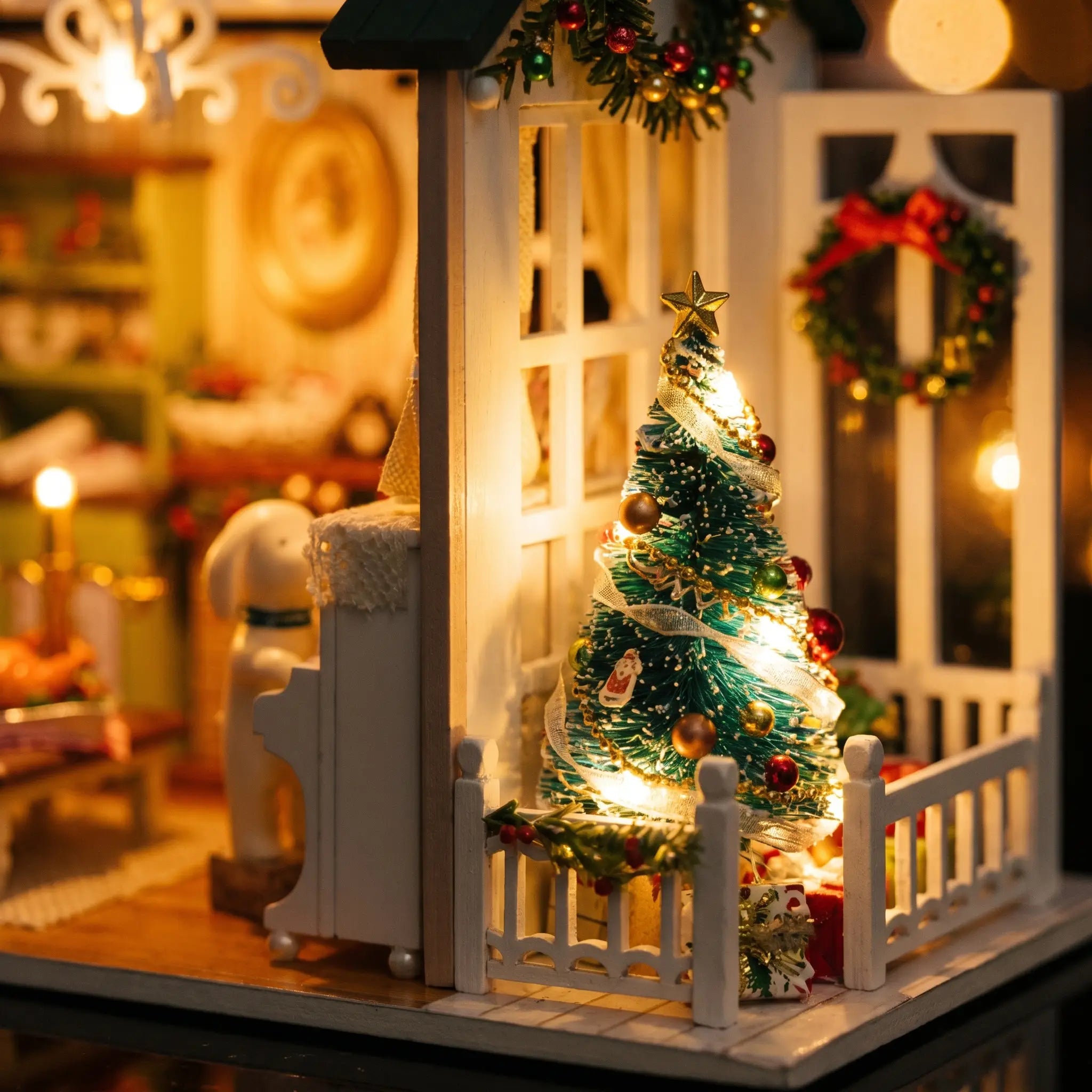 Close-up of the decorated lit Christmas tree inside The Christmas Parlour